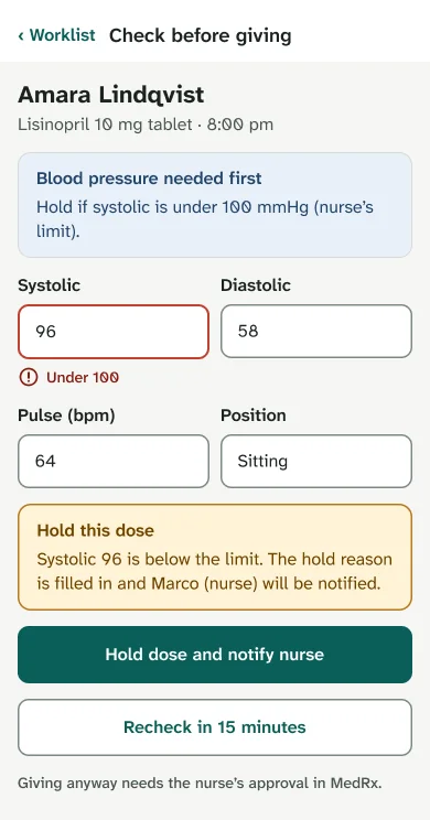 Mobile pre-dose check: systolic 96 flagged under 100, and 'Hold this dose' with Hold dose and notify nurse as the main action.